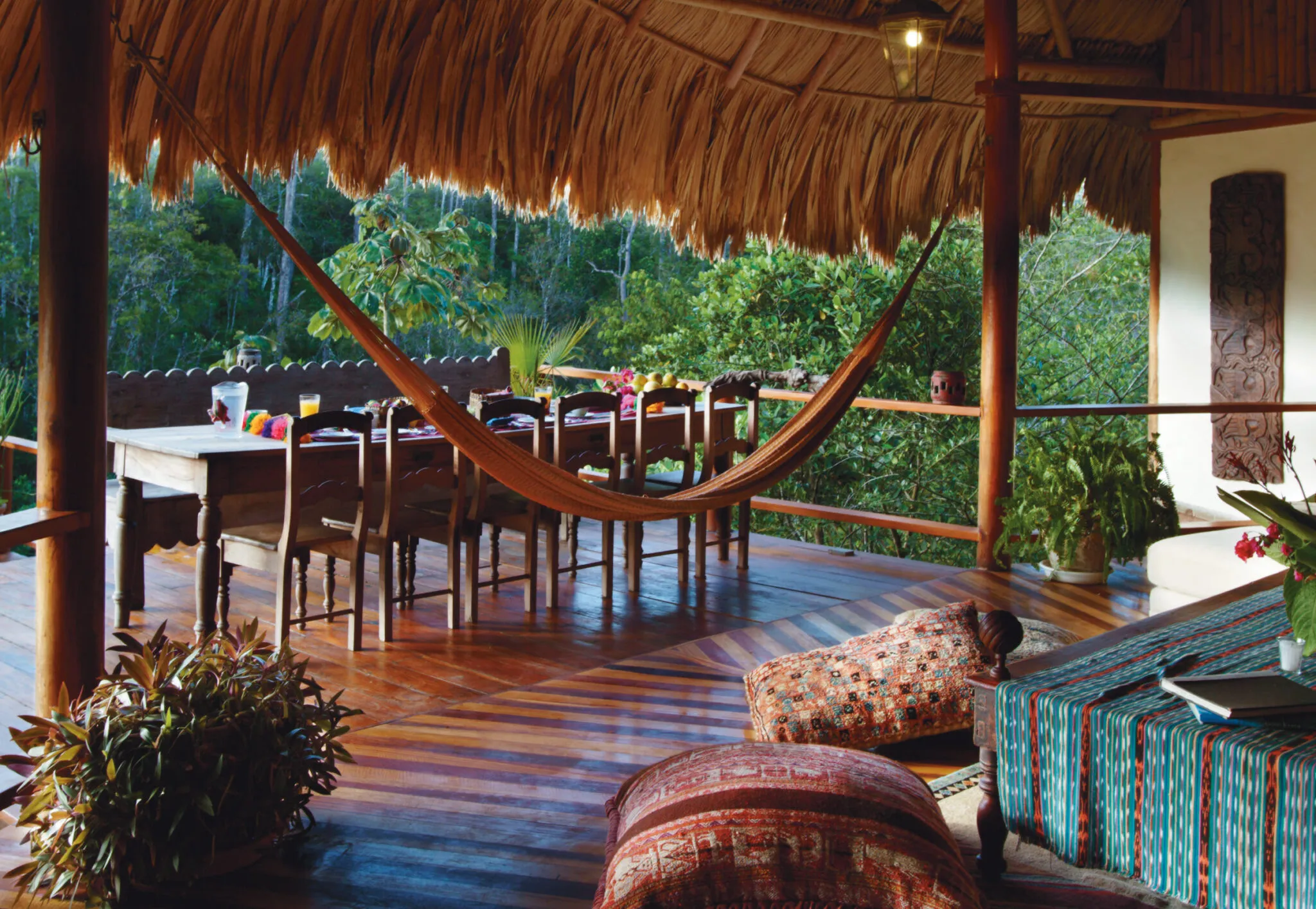 Porch with hammock and outdoor dining table