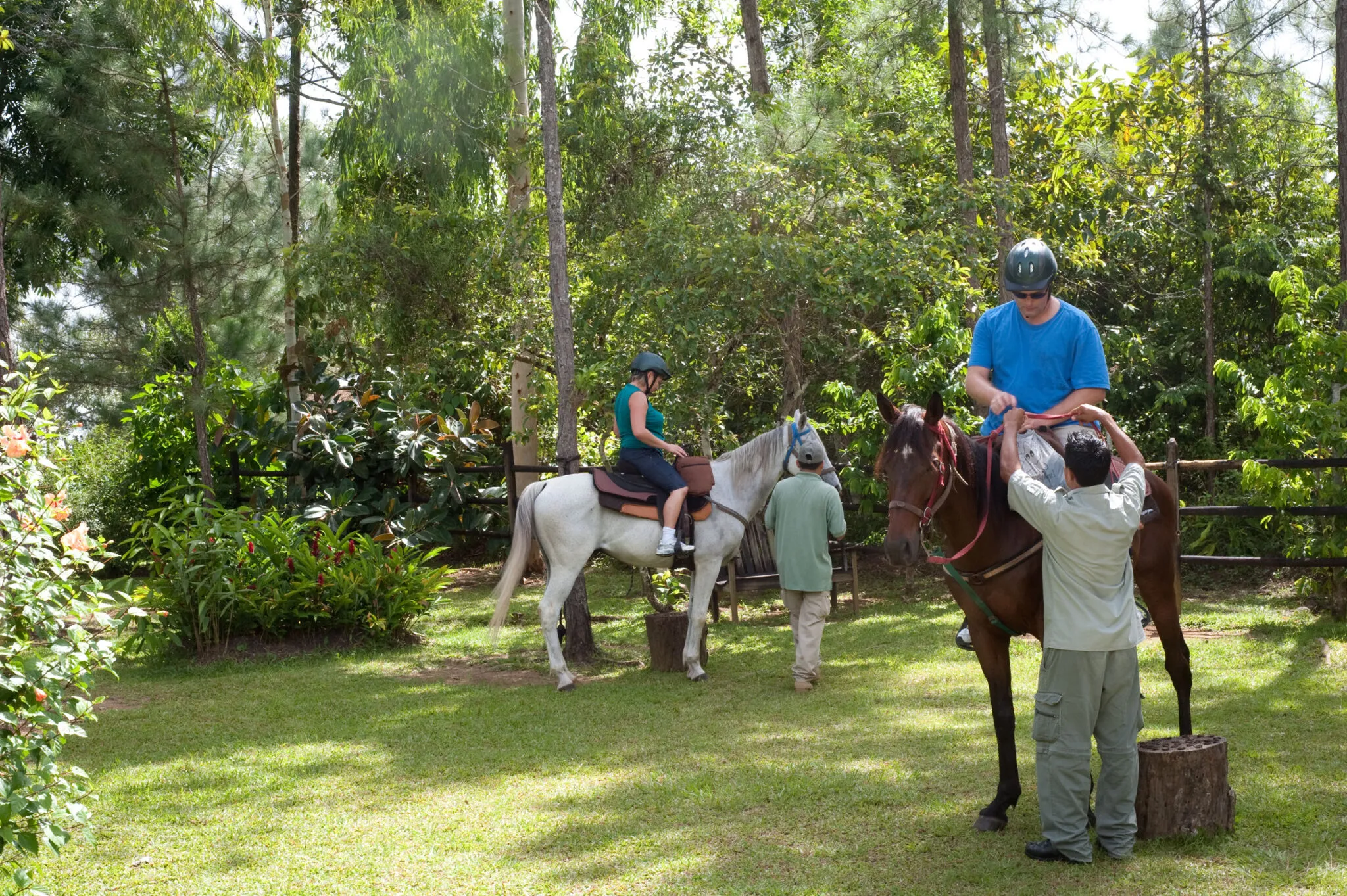 A group preparing to leave on a horseback riding trip