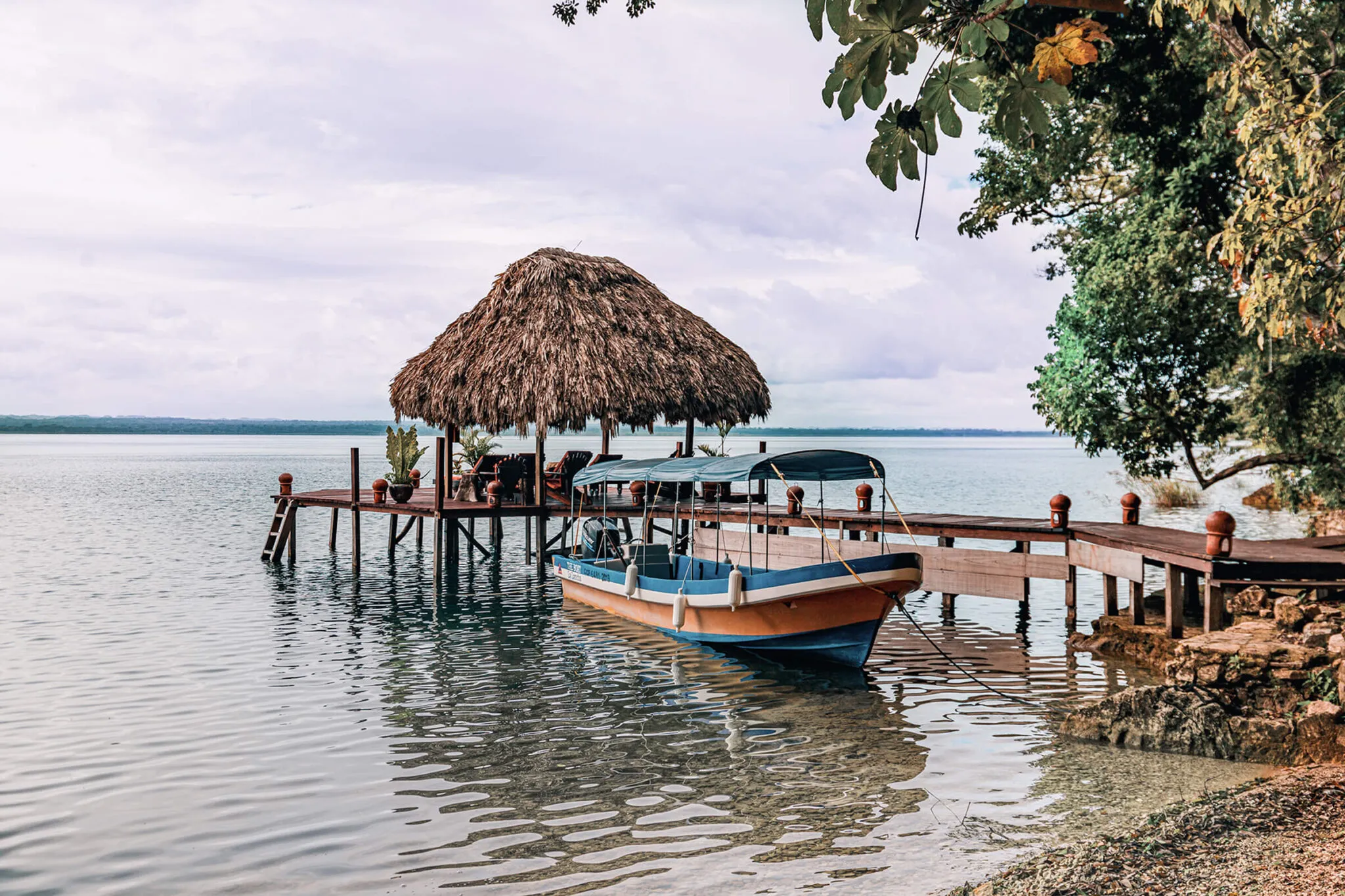 A boat tied up to a dock at La Lancha.