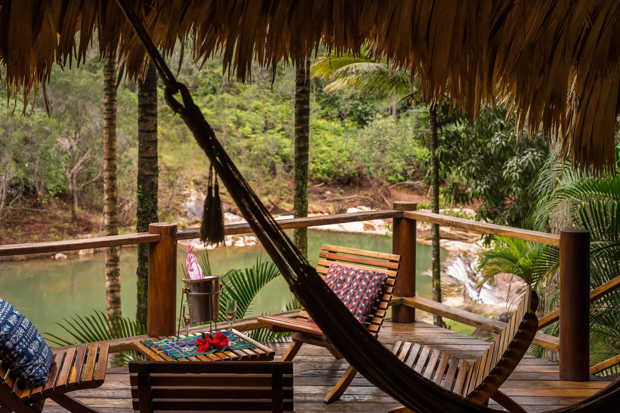 Chairs on a patio overlooking the water