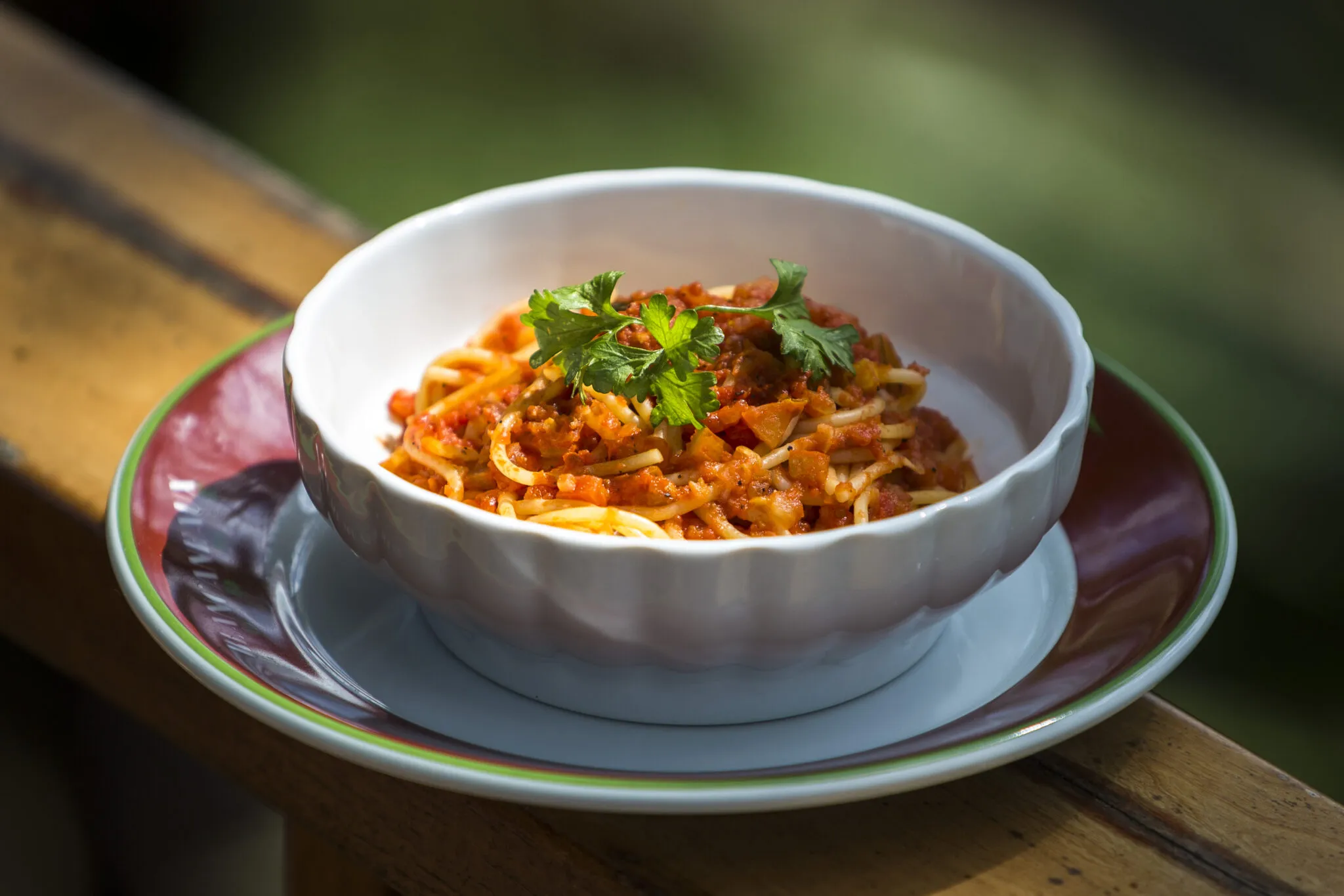 pasta and sauce in a white bowl