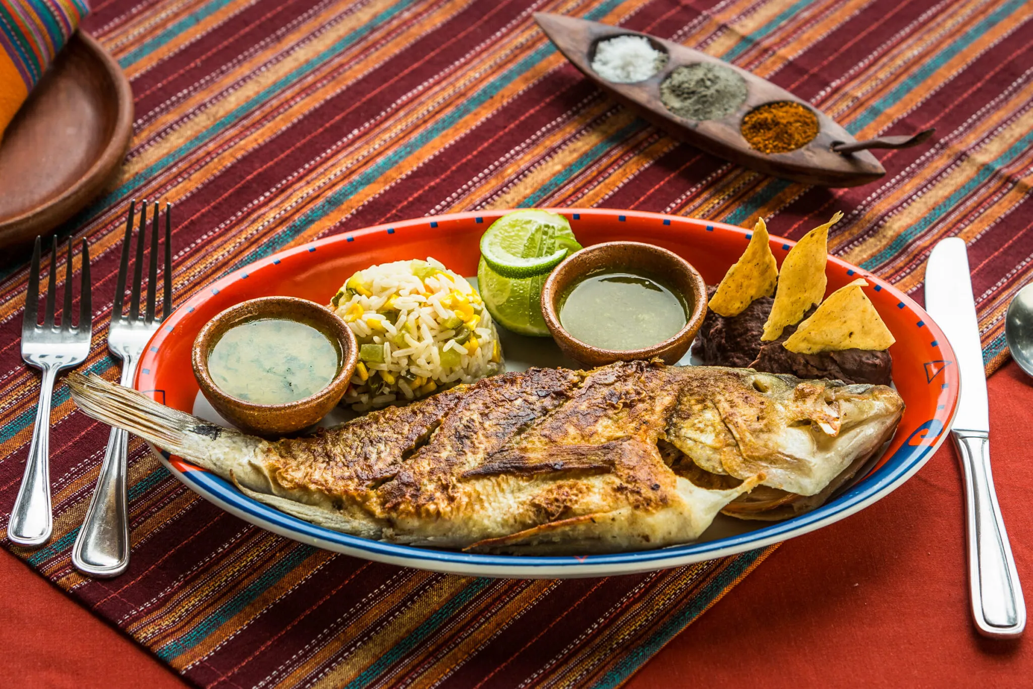 A close up of a fish and rice dish at the restaurant at La Lancha.