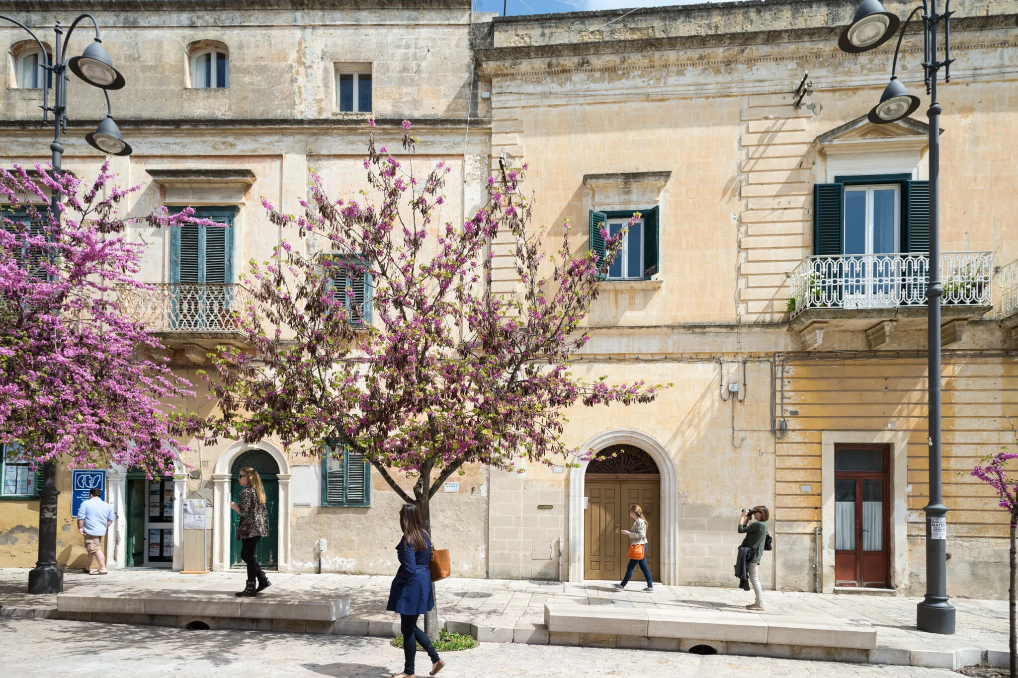 People walk on the streets of Matera