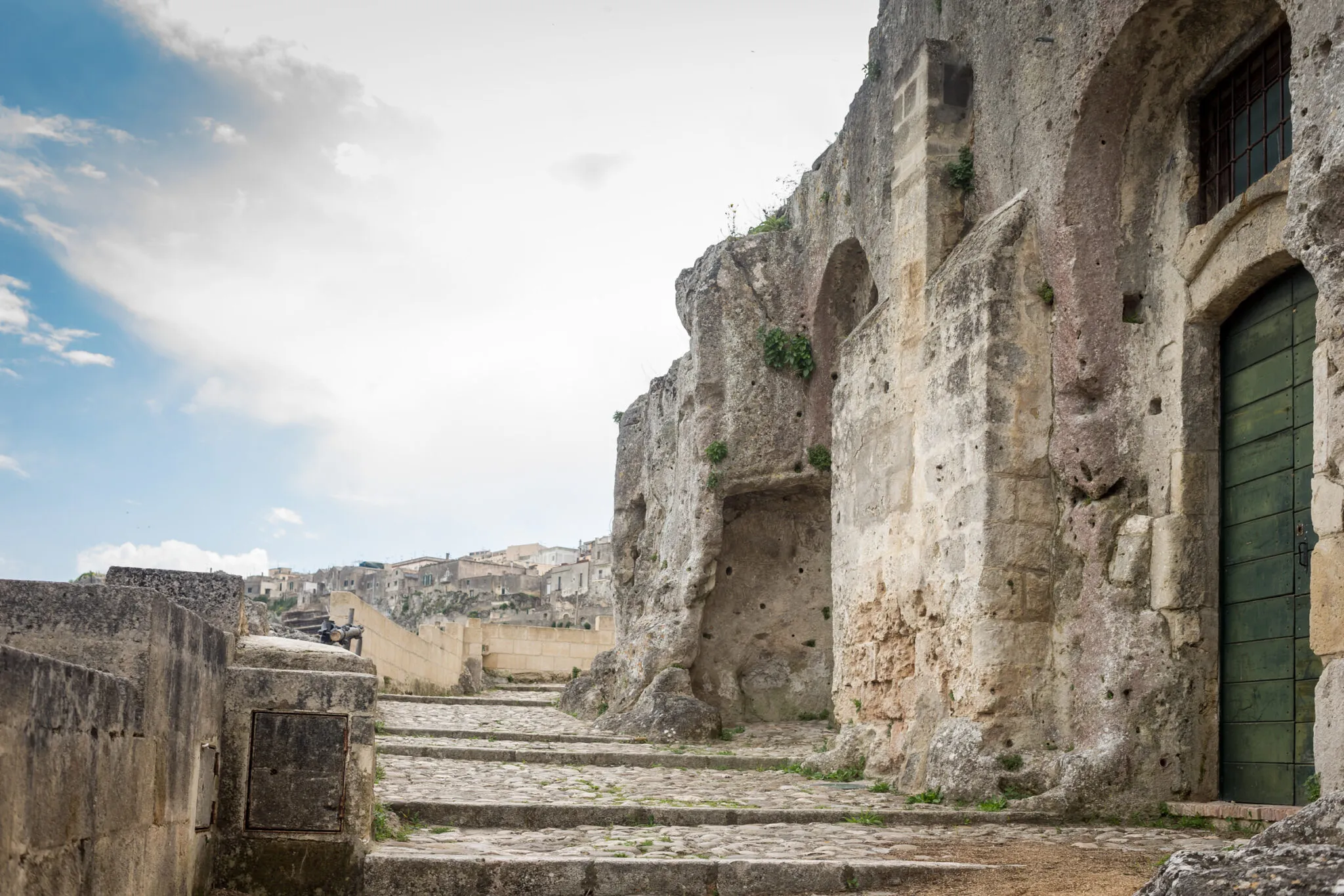 Stone walkways and brick buildings in Matera