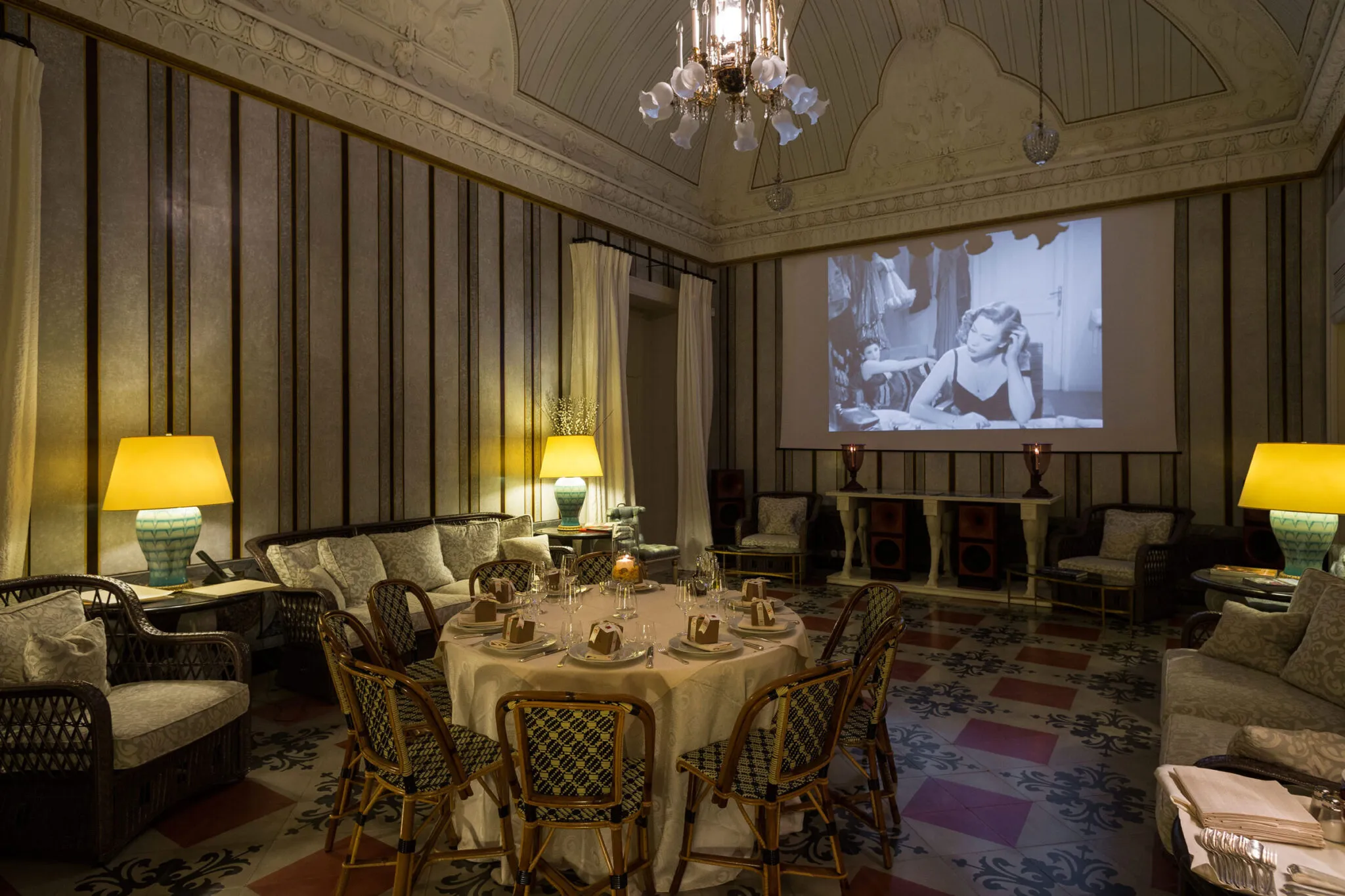 A dining table set up in the salon