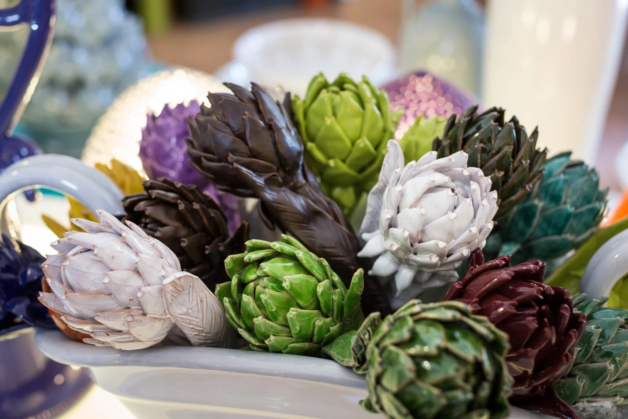 purple, green and white ceramic artichokes