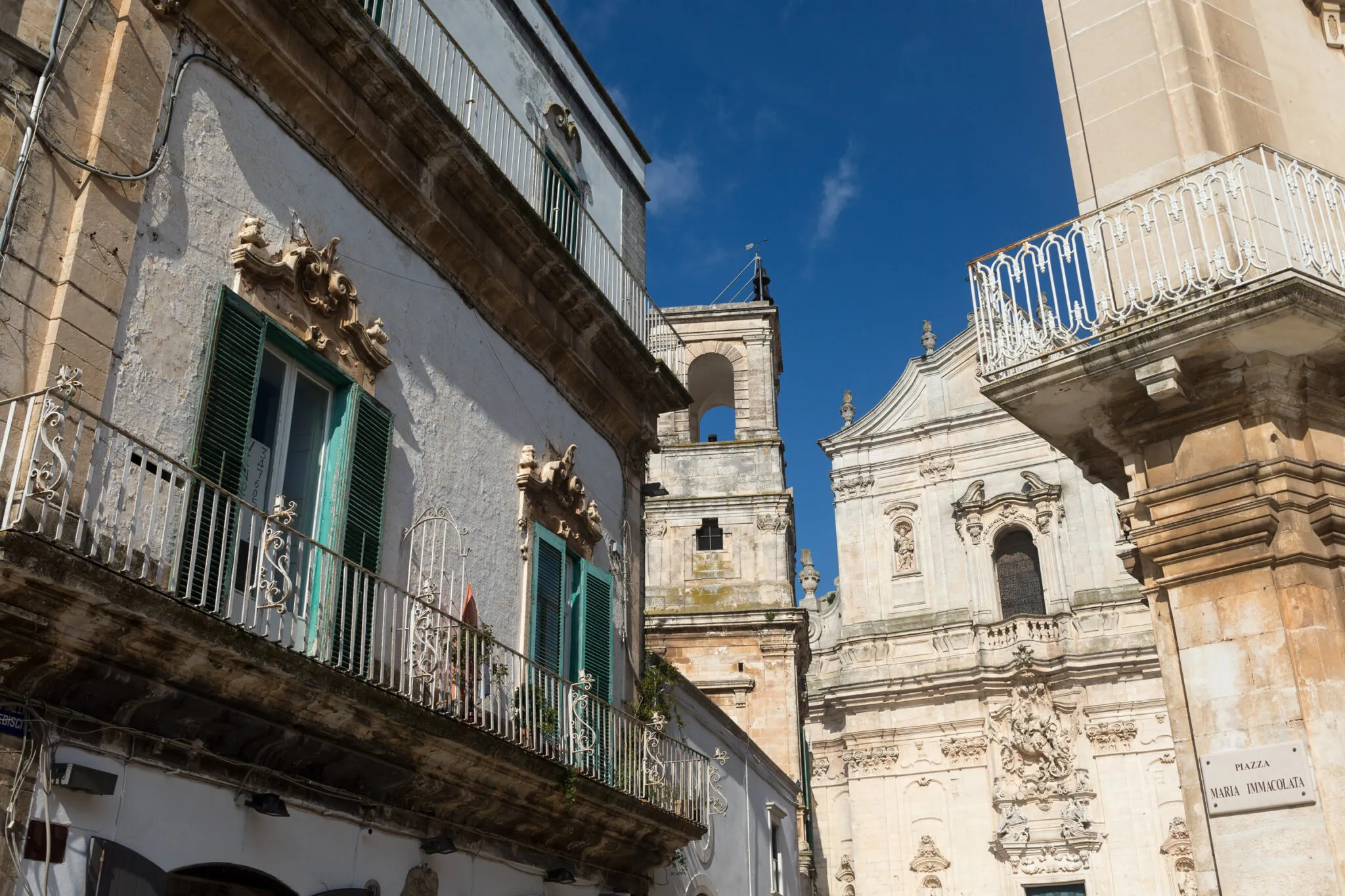 Balconies with a church in the background