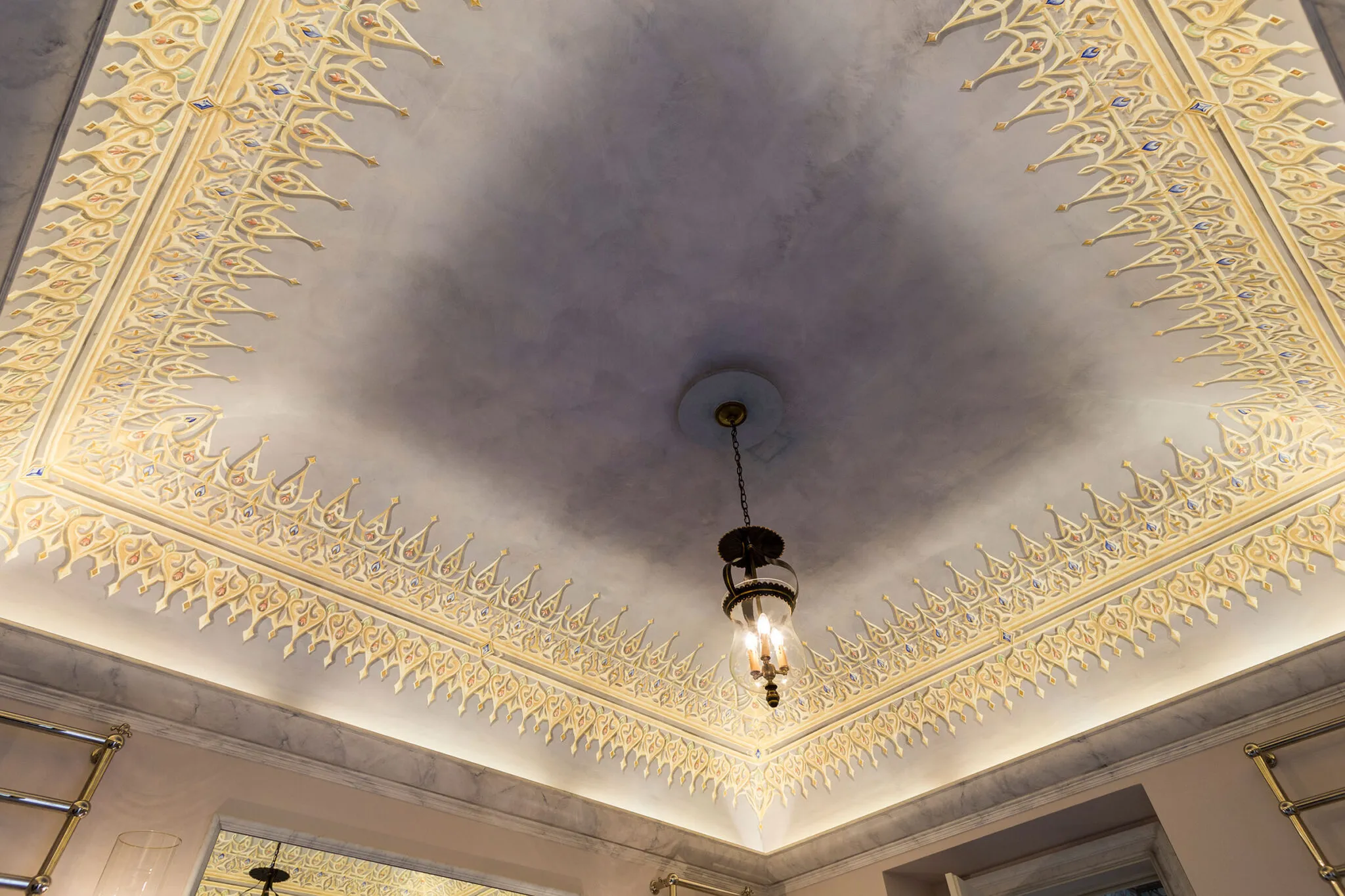 Bathroom ceiling with ornate molding