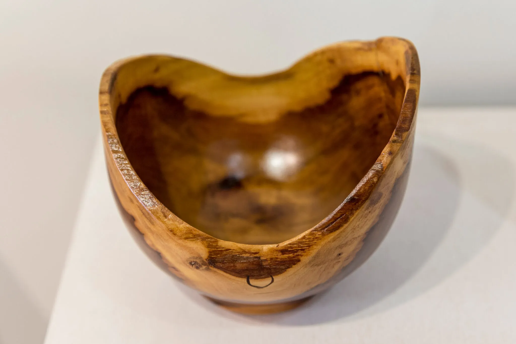 wooden bowl with uneven lip