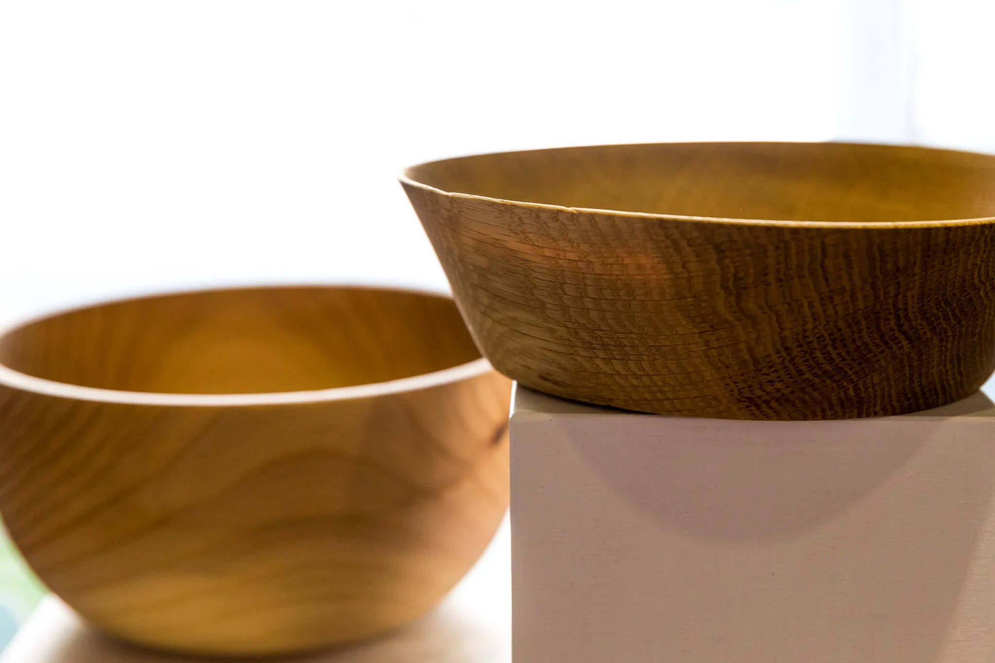 Two smooth wooden bowls