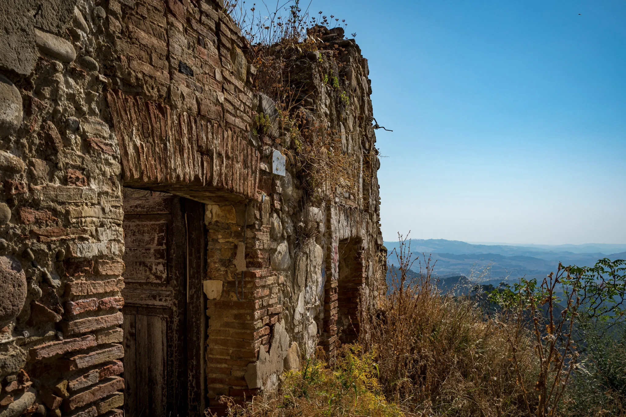 Stone building on the hillside at Aliano