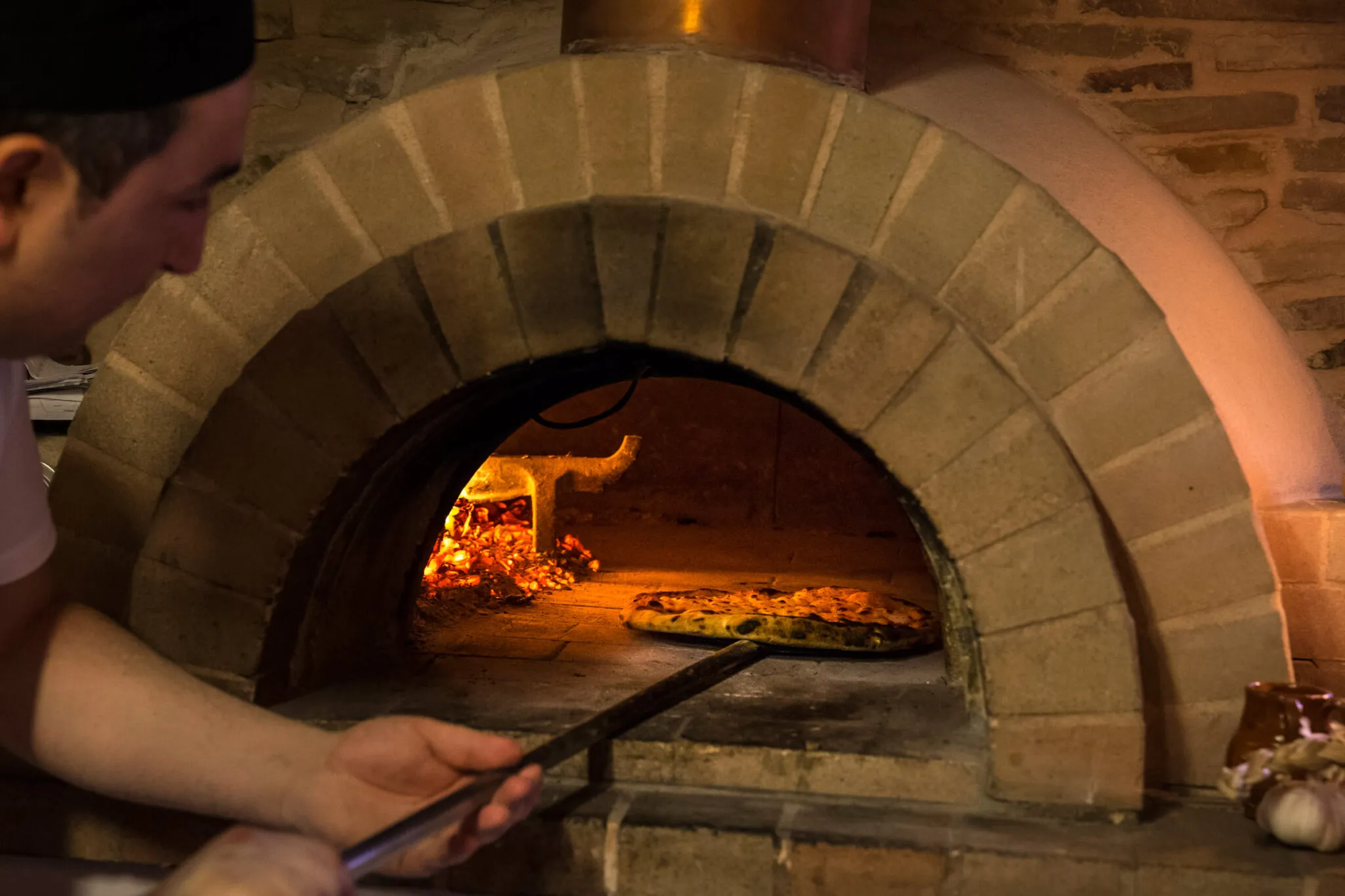 Making a pizza in the eat-in kitchen