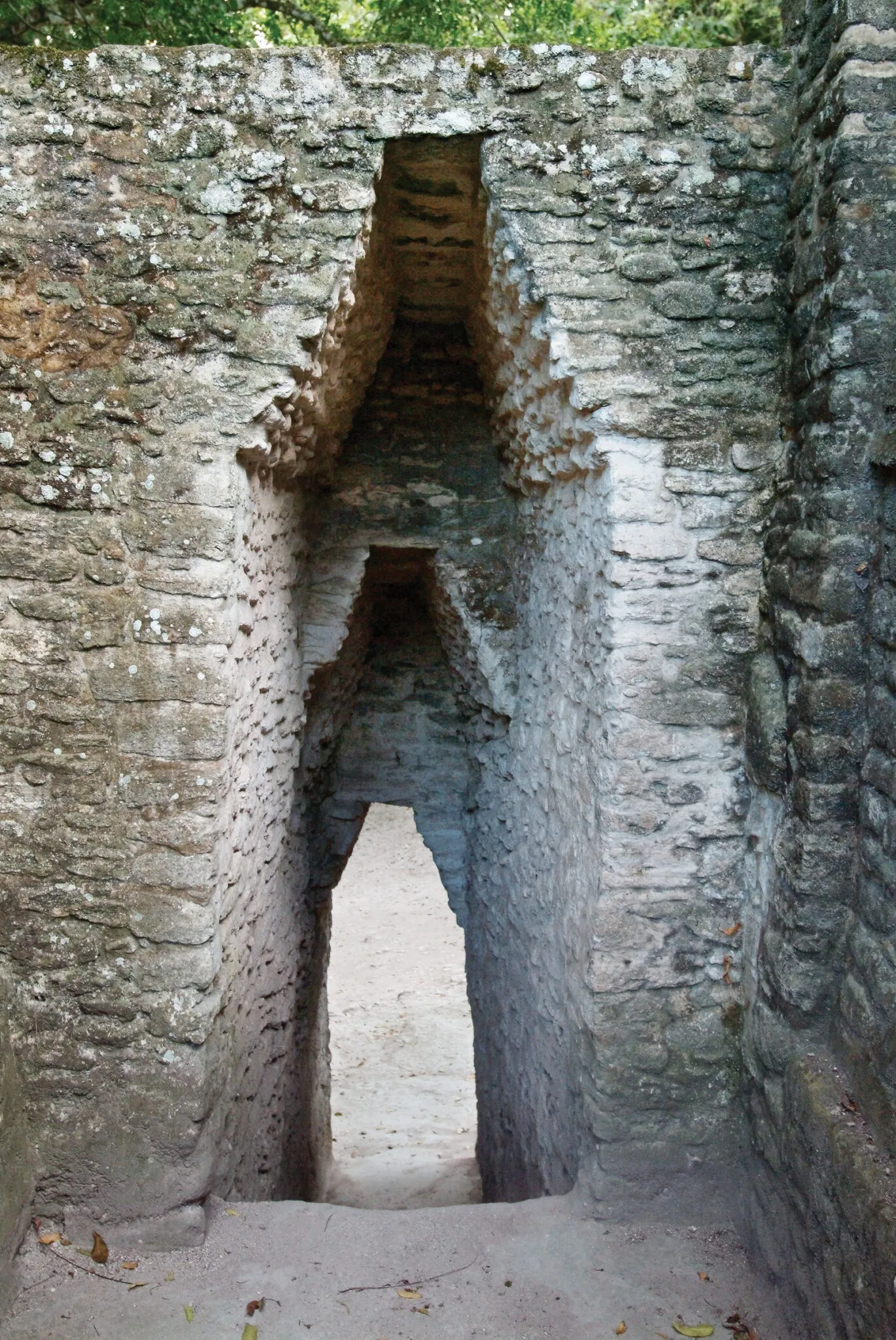 A narrow brick doorway at Cahal Pech