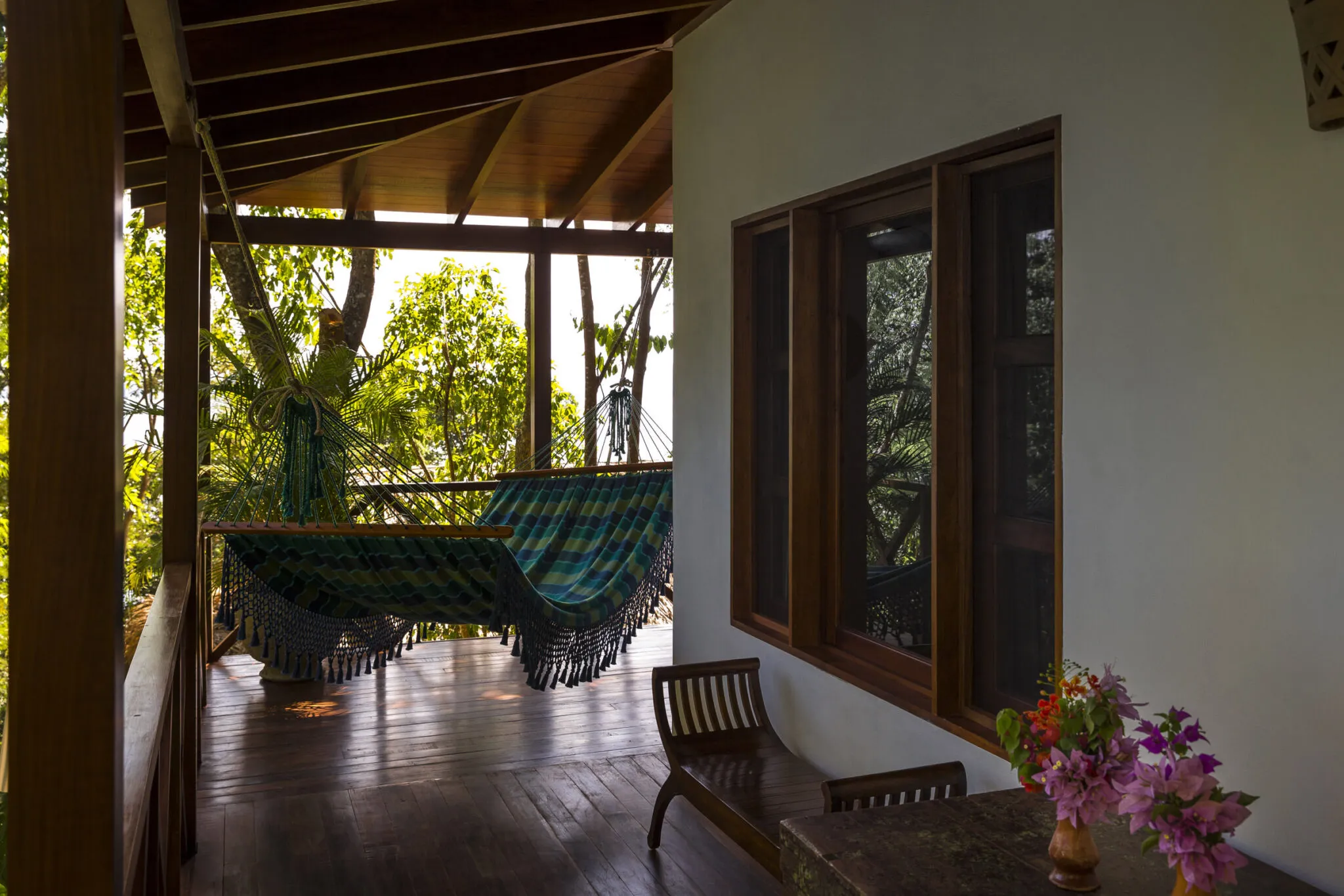 A hammock hanging in the Rainforest Junior Suite at La Lancha.