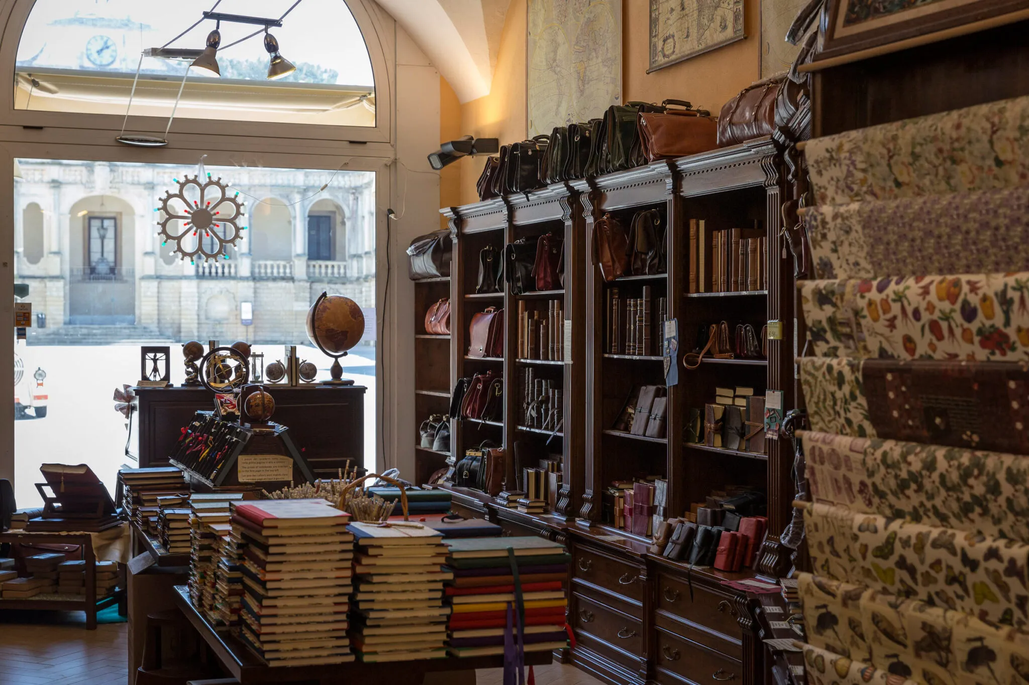 A shop selling leather goods, paper and books