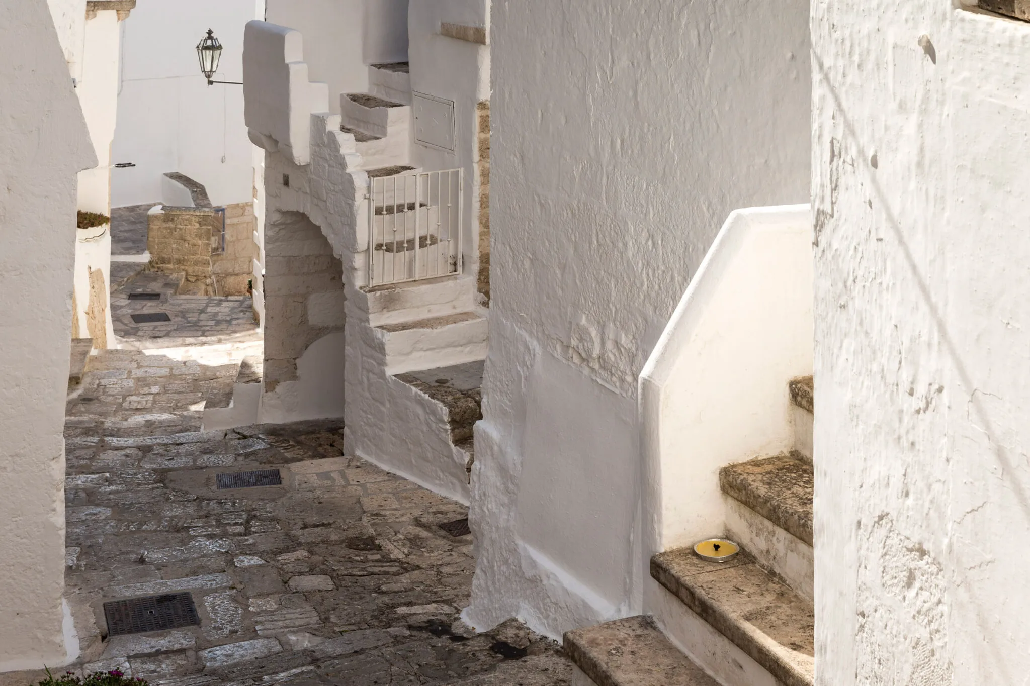 White stone stairways between buildings