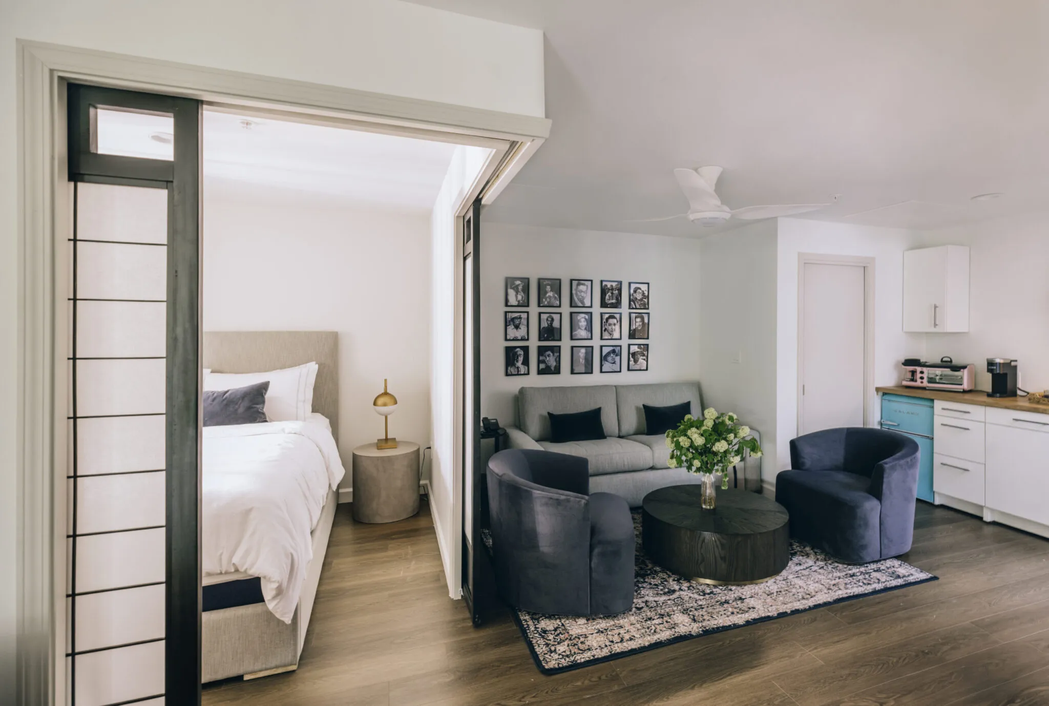 A living area leads to a bedroom, separated by a Japanese-style sliding door.